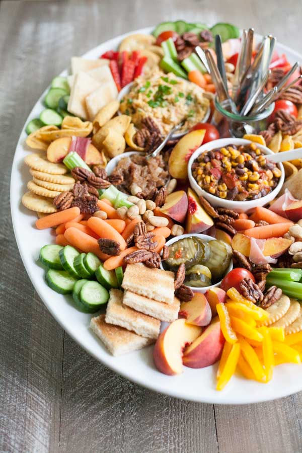 Southern Pimento Cheese Appetizer Tray | BourbonandHoney.com -- Packed with fruit, veggies, crackers and lot of cheese, this Southern Pimento Cheese Snack Tray is quick to make and can serve a crowd!