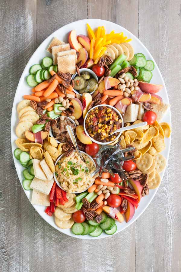 Southern Pimento Cheese Appetizer Tray | BourbonandHoney.com -- Packed with fruit, veggies, crackers and lot of cheese, this Southern Pimento Cheese Snack Tray is quick to make and can serve a crowd!