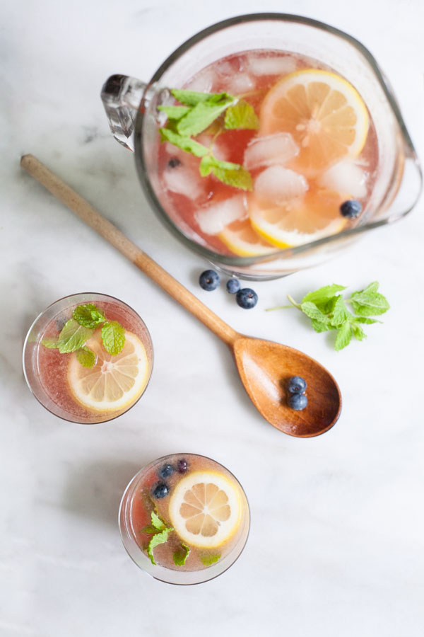 Bourbon and Honey Blueberry Smash Cocktail | BourbonandHoney.com -- Fresh, boozy and perfect for a crowd, this Bourbon and Honey Blueberry Smash Cocktail is ready for happy hour!