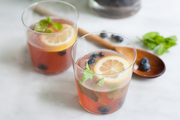 Bourbon and Honey Blueberry Smash Cocktail | BourbonandHoney.com -- Fresh, boozy and perfect for a crowd, this Bourbon and Honey Blueberry Smash Cocktail is ready for happy hour!