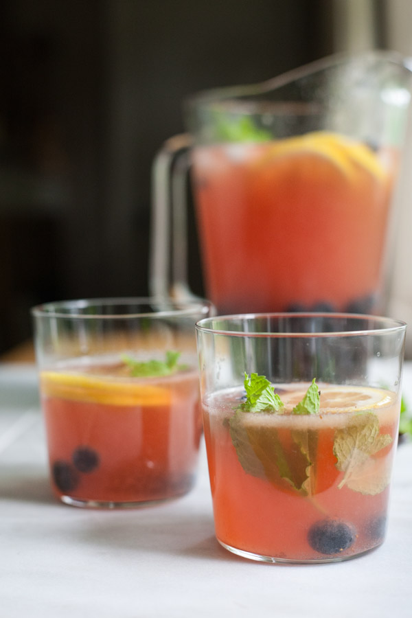 Bourbon and Honey Blueberry Smash Cocktail | BourbonandHoney.com -- Fresh, boozy and perfect for a crowd, this Bourbon and Honey Blueberry Smash Cocktail is ready for happy hour!