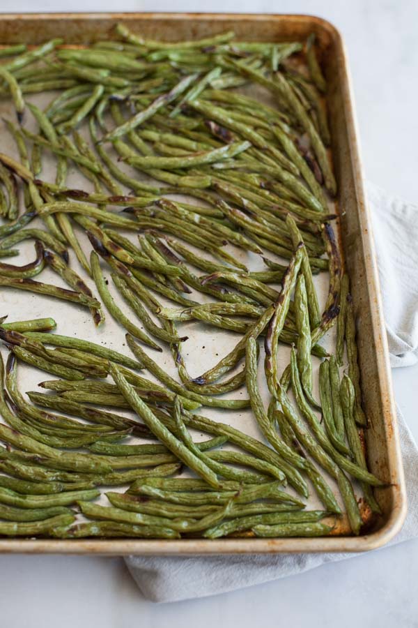 Spicy Szechuan Green Beans | BourbonandHoney.com -- Quick, spicy and totally delicious, these Szechuan Green Beans are the perfect side dish for a dinner party or a weeknight dish.