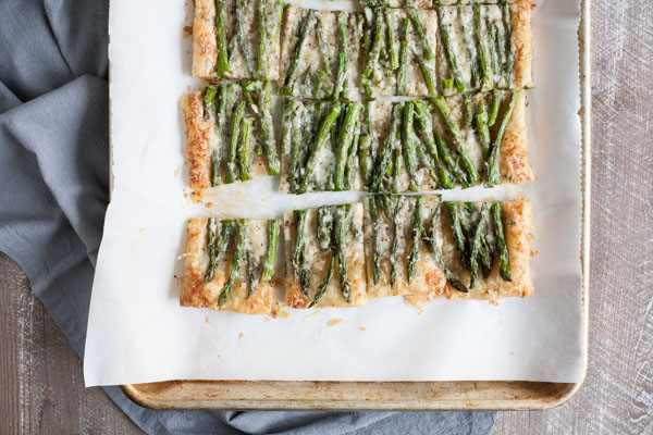 Spring Asparagus Galette | BourbonandHoney.com -- Cheesy, crispy and packed with veggies, this Spring Asparagus Galette is perfect for Easter, Mother's day or a family brunch!