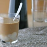 Cold Brewed Coffee with Vanilla Coconut Cream | BourbonandHoney.com -- Cold brewed coffee sweetened with ice cubes made from sweetened condensed milk, coconut milk and a vanilla bean. It's highly caffeinated, creamy and smooth.