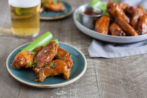 Bourbon and Honey Baked Chicken Wings | BourbonandHoney.com -- These Bourbon and Honey Baked Chicken Wings are sticky, messy, boozy and oh so flavorful! They're perfect for game day, or any-day!
