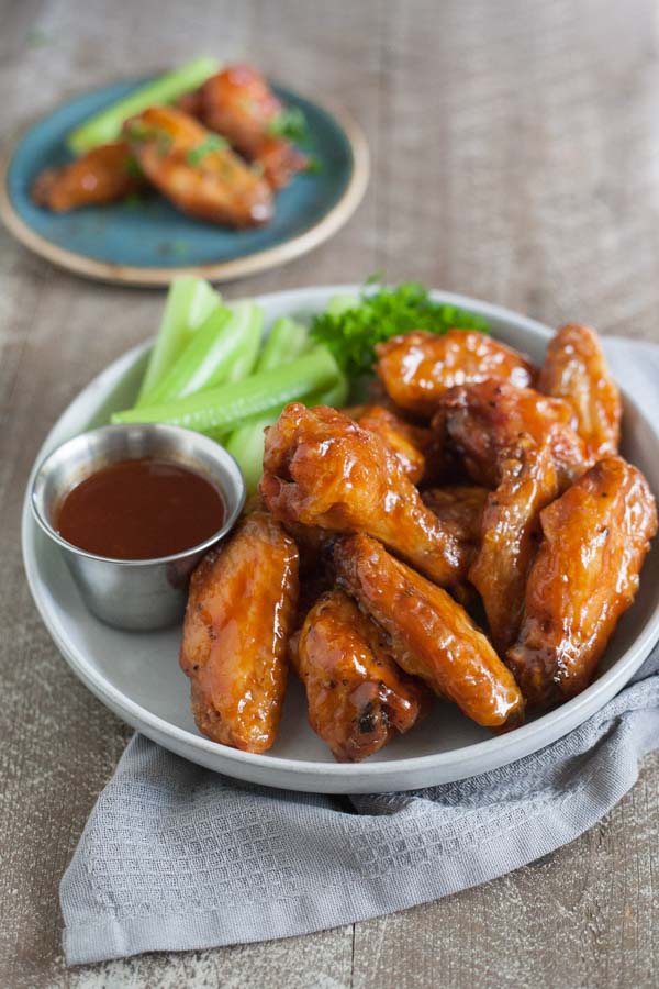 Bourbon and Honey Baked Chicken Wings | BourbonandHoney.com -- These Bourbon and Honey Baked Chicken Wings are sticky, messy, boozy and oh so flavorful! They're perfect for game day, or any-day!