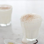 Bourbon and Honey Milk Punch | BourbonandHoney.com -- A delicious holiday recipe for Bourbon Milk Punch made with bourbon whiskey, half-and-half, honey syrup and nutmeg.