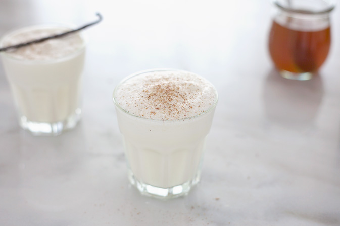 Bourbon and Honey Milk Punch | BourbonandHoney.com -- A delicious holiday recipe for Bourbon Milk Punch made with bourbon whiskey, half-and-half, honey syrup and nutmeg.