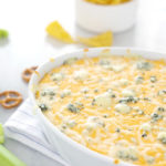 Beer Cheese Buffalo Chicken Dip | BourbonandHoney.com -- The perfect game day dip, this Beer Cheese Buffalo Chicken Dip is spicy, cheesy and guaranteed to be a crowd pleaser!
