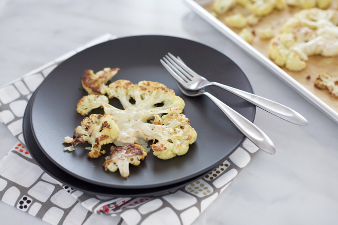 Roasted Cauliflower Steaks with Gruyère | BourbonandHoney.com