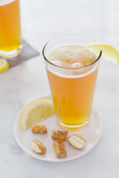 Bourbon and Honey Beer Cocktail | BourbonandHoney.com -- This fresh beer cocktail is made with bourbon, honey, lemon juice, bitters and beer. It’s beer made even better with a shot of whiskey!