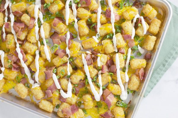 Bacon Cheddar Tater Tot Nachos | BourbonandHoney.com