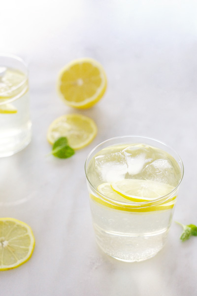 White Wine Spritzer | BourbonAndHoney.com -- Refreshing, lemony and delicious, this White Wine Spritzer is the perfect warm weather cocktail. 