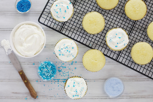Vanilla Bean Cupcakes with Fluffy White Frosting | BourbonandHoney.com