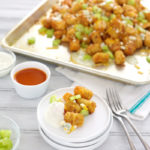 Buffalo Chicken Tater Tot Nachos | BourbonAndHoney.com -- These Buffalo Chicken Tater Tot Nachos are a mashup of a few of the best game-day party dishes, buffalo wings and tater tots and nachos!