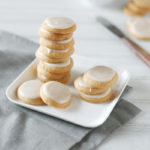 Brown Butter Sugar Cookies with Vanilla Bean Icing | BourbonandHoney.com -- Irresistibly simple but surprisingly complex, these Brown Butter Sugar Cookies are topped with a light vanilla bean icing for the perfect little bite!