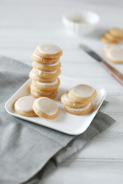 Brown Butter Sugar Cookies with Vanilla Bean Icing | BourbonandHoney.com -- Irresistibly simple but surprisingly complex, these Brown Butter Sugar Cookies are topped with a light vanilla bean icing for the perfect little bite!