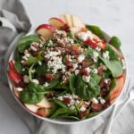 Apple, Blue Cheese and Bacon Chop Salad | BourbonandHoney.com -- This chopped bacon and blue cheese salad is packed with fresh apples, crumbled blue cheese, crispy bacon topped with a dijon vinaigrette.