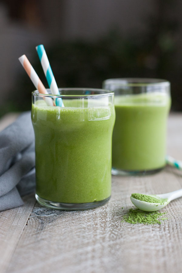 Coconut Banana Matcha Smoothie | BourbonandHoney.com -- Energizing, slightly sweet and totally delicious, this Coconut Banana Matcha Smoothie is a great on-the-go breakfast.