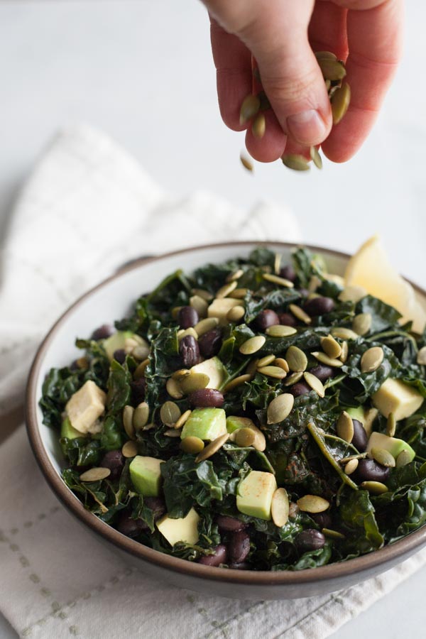 Greens and Black Beans | BourbonandHoney.com -- This big bowl of Greens and Black Beans is hearty, fresh and nourishing. Serve it for a light lunch or stuffed it in a tortilla with roasted veggies.