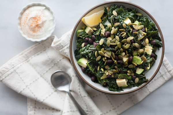 Greens and Black Beans | BourbonandHoney.com -- This big bowl of Greens and Black Beans is hearty, fresh and nourishing. Serve it for a light lunch or stuffed it in a tortilla with roasted veggies.