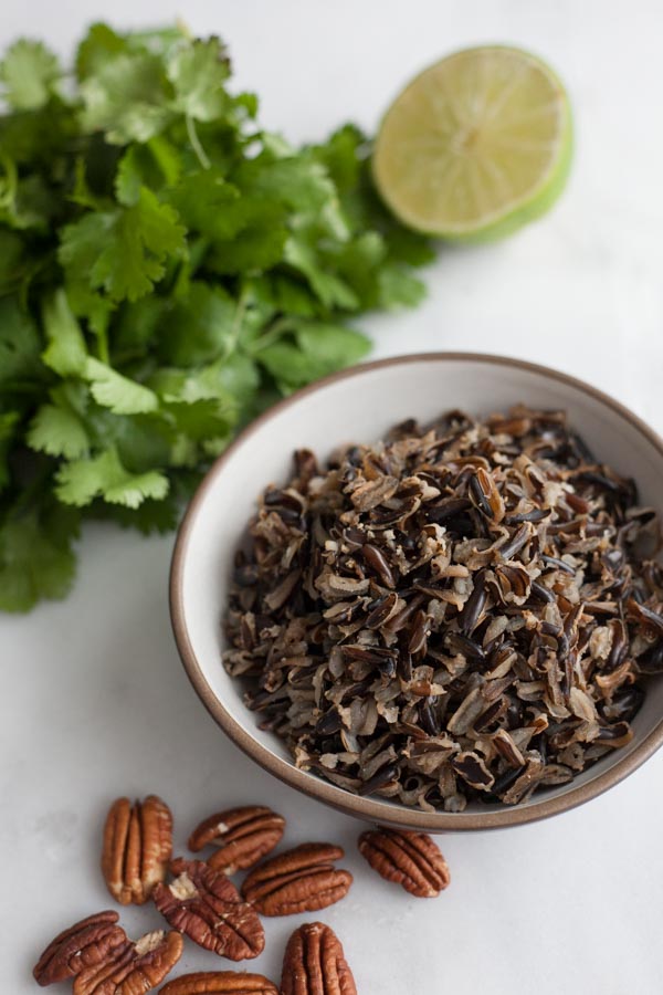 Wild Rice Salad with Pecans | BourbonandHoney.com -- This hearty wild rice salad is nutty, citrusy, fresh and delicious. It's a great winter weather side dish!