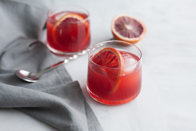 Blood Orange Negroni | BourbonandHoney.com -- This delicious Blood Orange Negroni is citrusy, light and the perfect cocktail to brighten your winter.