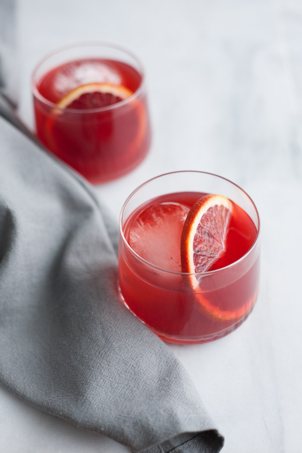 Blood Orange Negroni | BourbonandHoney.com -- This delicious Blood Orange Negroni is citrusy, light and the perfect cocktail to brighten your winter.