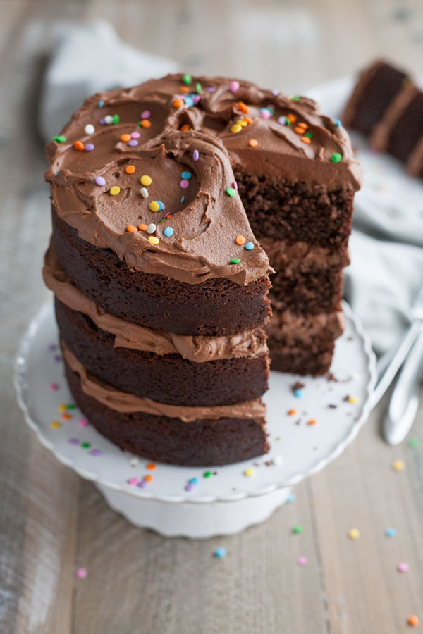 Chocolate Birthday Cake | BourbonandHoney.com -- Tall, dark, chocolatey and delicious this chocolate birthday cake is impressive and the perfect way to celebrate!
