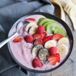 Strawberry Banana Smoothie Bowl | BourbonandHoney.com -- Simple, delicious and packed with fruit, this Strawberry Banana Smoothie Bowl is a great breakfast on the go!