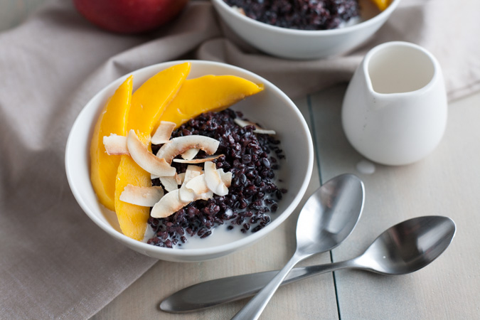 Black Rice Pudding with Coconut and Mango | BourbonandHoney.com Square -- Warm, comforting and delicious, this Black Rice Pudding with Coconut and Mango is perfect for breakfast, a snack or even dessert!