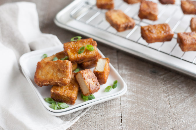 Crispy Marinated Tofu | BourbonandHoney.com -- Spicy and savory, this Crispy Marinated Tofu is a flavorful and delicious way to serve a vegetarian favorite.