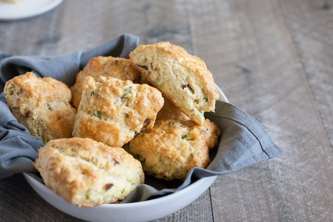 Savory Scones with Gruyère and Bacon | BourbonandHoney.com -- Flakey, buttery, cheesy and studded with bacon these Savory Scones are perfect for brunch or an afternoon snack.