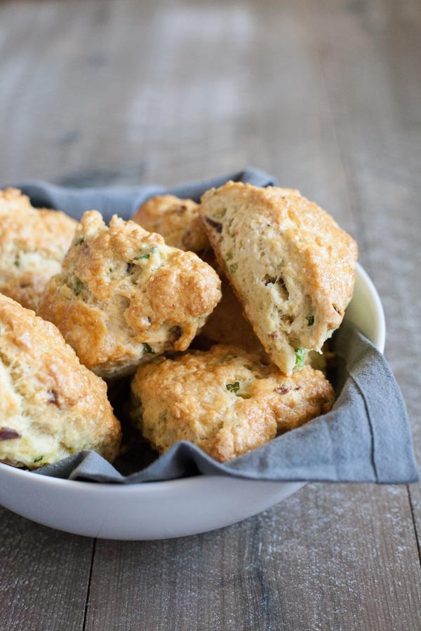 Savory Scones with Gruyère and Bacon | BourbonandHoney.com -- Flakey, buttery, cheesy and studded with bacon these Savory Scones are perfect for brunch or an afternoon snack.