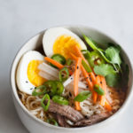 Slow Cooker Pork Ramen | BourbonandHoney.com -- The complex flavors of ramen are made easy with this Slow Cooker Pork Ramen recipe with all the fresh yummy toppers you could want!