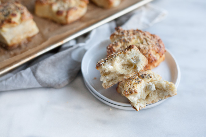 Cream Cheese Stuffed Everything Bagel Biscuits | BourbonandHoney.com -- Crunchy, salty and studded with pockets of cream cheese, these everything bagel biscuits are an impressive and delicious brunch addition.