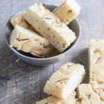 Garlic Rosemary Focaccia Bread | BourbonandHoney.com -- Garlicky, herby and delicious, this Rosemary Focaccia Bread is soft, rich and chewy and perfect for pizza crust, snacking or sandwiches.