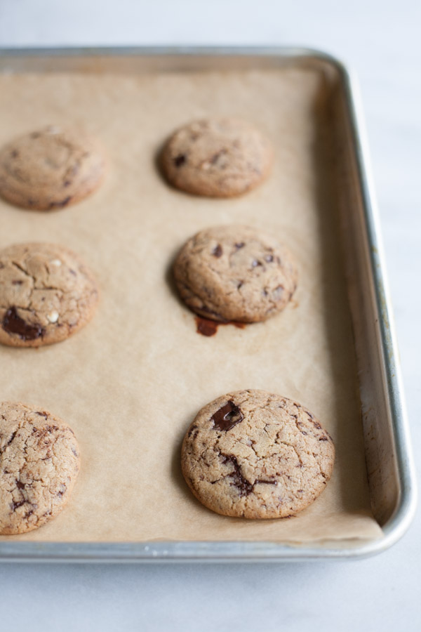 Small Batch Chocolate Chunk Cookies | BourbonandHoney.com -- A quick and easy recipe for a small batch ooey-gooey Chocolate Chunk Cookies with a bit of almond butter and a sprinkle of salt to cure any sweet tooth.