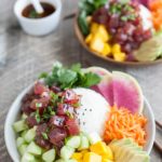 Ahi Tuna Poke Rice Bowl | BourbonandHoney.com -- This Ahi Tuna Poke Rice Bowl is straight from Hawaii! It's packed with fresh toppings and lots of tender tuna for a healthy, flavorful bowl.