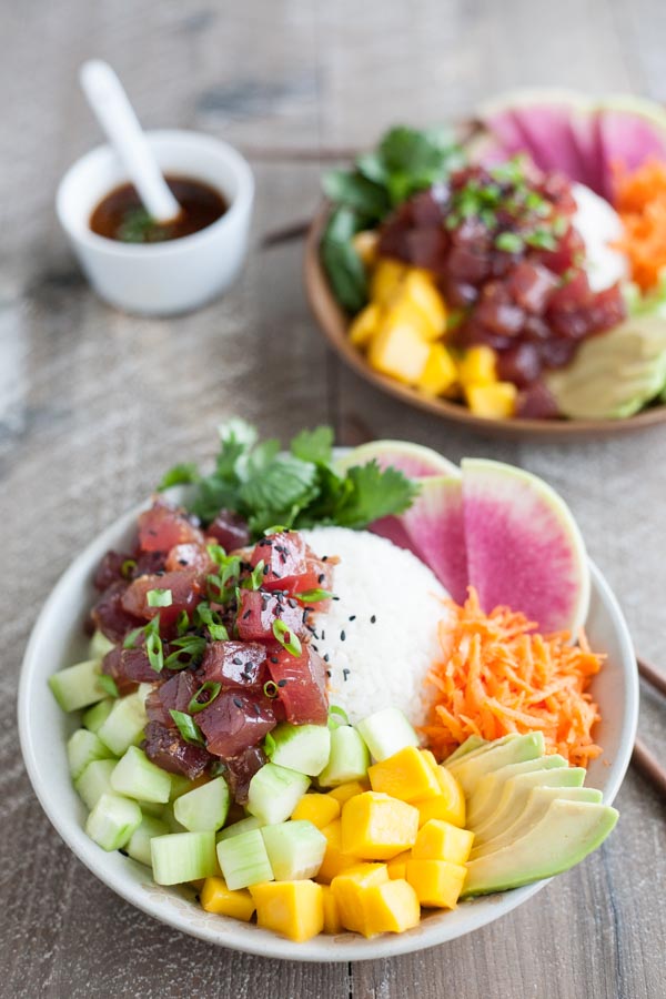 Ahi Tuna Poke Rice Bowl | BourbonandHoney.com -- This Ahi Tuna Poke Rice Bowl is straight from Hawaii! It's packed with fresh toppings and lots of tender tuna for a healthy, flavorful bowl.
