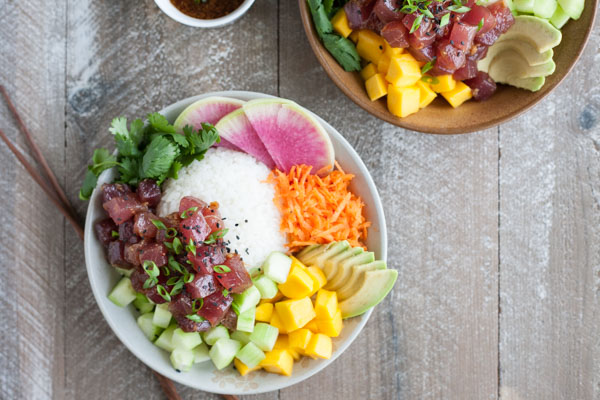 Ahi Tuna Poke Rice Bowl | BourbonandHoney.com -- This Ahi Tuna Poke Rice Bowl is straight from Hawaii! It's packed with fresh toppings and lots of tender tuna for a healthy, flavorful bowl.