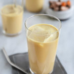 Golden Milk Turmeric Iced Latte | BourbonandHoney.com -- This creamy, cool and slightly sweet Turmeric Iced Latte is a soothing drink made with fresh turmeric, ginger, lemon and almond milk.