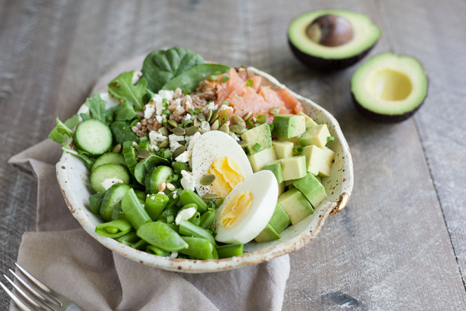 Smoked Salmon Farro Salad Bowls | BourbonandHoney.com -- This Smoked Salmon Farro Salad Bowl is a fresh and hearty recipe packed with tasty toppings and a light garlic-lime vinaigrette.