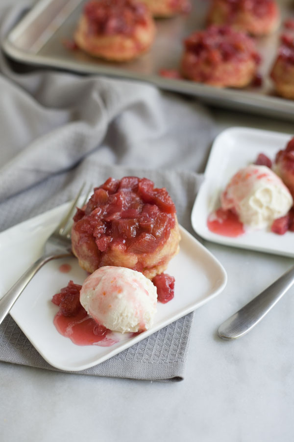 Rhubarb Upside-Down Cupcakes | BourbonandHoney.com --Tangy, tender and slightly sweet, these Rhubarb Upside-Down Cupcakes are an easy and tasty summer treat topped with ice cream!