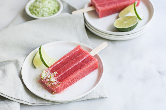 Strawberry Margarita Frozen Pops | BourbonandHoney.com -- These tequila spiked Strawberry Margarita Frozen Pops will be your new go-to summer treat. They're boozy, fruity and perfectly frosty on a hot day!