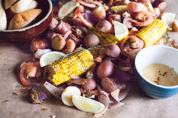 Easy Shrimp Boil | BourbonandHoney.com -- This quick and Easy Shrimp Boil is a flavorful one-pot meal fit for a crowd! It's packed with potatoes, corn, shrimp and sausage.