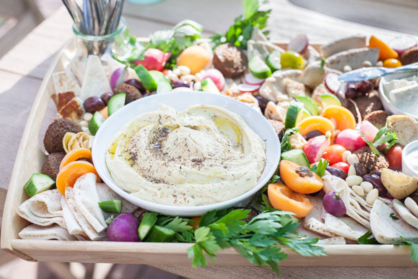 Ultimate Mediterranean Hummus Platter | BourbonandHoney.com -- Ultimate Mediterranean Hummus Platter | BourbonandHoney.com -- This Mediterranean Hummus platter is the ultimate party appetizer. No need to make anything from scratch, just throw together your favorite ingredients for a seriously simple yet impressive snack.