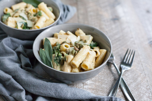 Creamy Pumpkin Alfredo Pasta with Kale | BourbonandHoney-com -- Rich, creamy and totally comforting, this Creamy Pumpkin Alfredo Pasta with Kale is a quick and flavorful weeknight dinner.