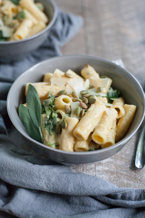 Creamy Pumpkin Alfredo Pasta with Kale | BourbonandHoney-com -- Rich, creamy and totally comforting, this Creamy Pumpkin Alfredo Pasta with Kale is a quick and flavorful weeknight dinner.
