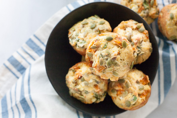 Spinach Feta and Sweet Potato Muffins | BourbonandHoney.com -- Hearty, savory and quick to make, these Spinach, Feta and Sweet Potato Muffins are a great make-ahead brunch or veggie packed snack.